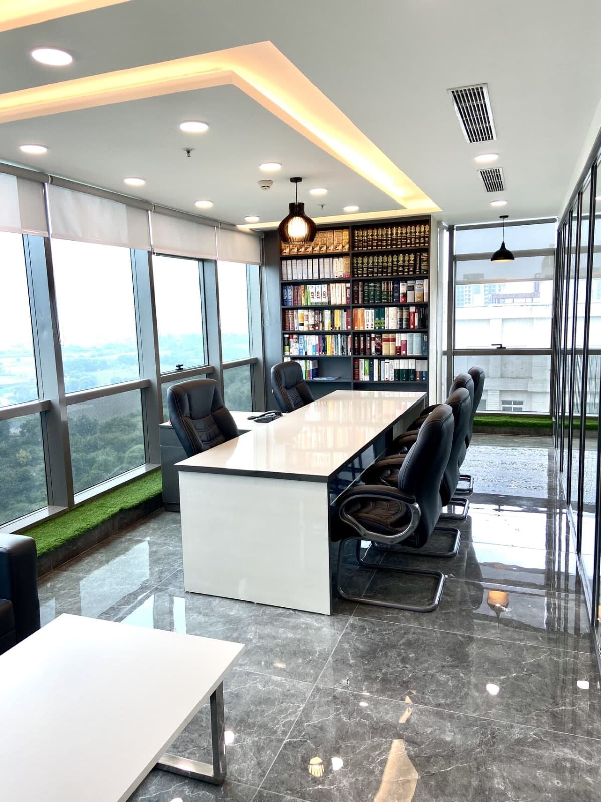 Executive conference room with professional library at Dewberry Advisors